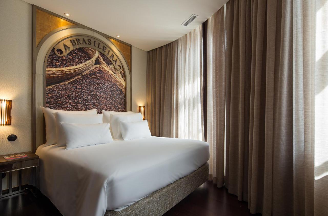 Pestana Porto - A Brasileira, City Center & Heritage Building מראה חיצוני תמונה A bedroom at the hotel